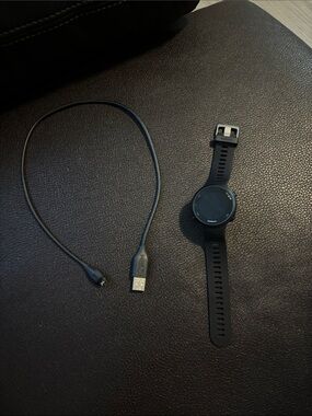 garmin black GPS forerunner 45 fitness watch with charging cable